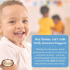 Child smiling with a text overlay about daily immune support, with a blurred background of people.